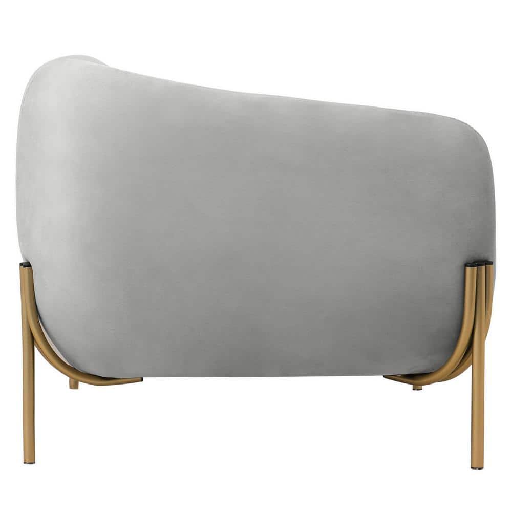 Close-up of the backrest of a light grey velvet armchair.