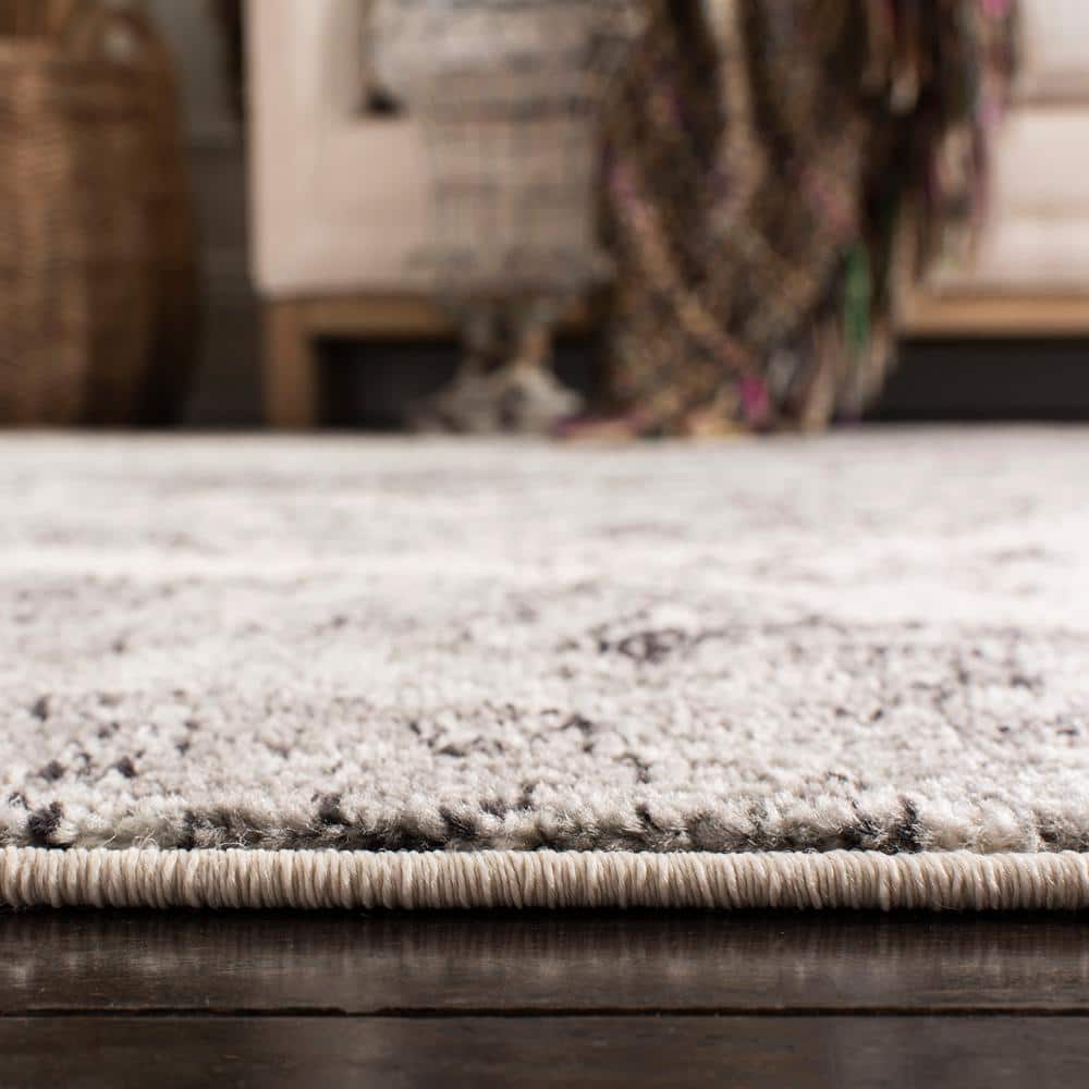 Elegant Cream/Silver Synthetic 9' x 12' Hand-Knotted Area Rug