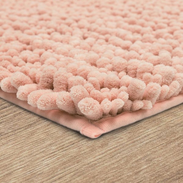 https://images.thdstatic.com/productImages/cd4af778-cd16-4700-8b71-594005c3893f/svn/blush-mohawk-home-bathroom-rugs-bath-mats-103799-1d_600.jpg