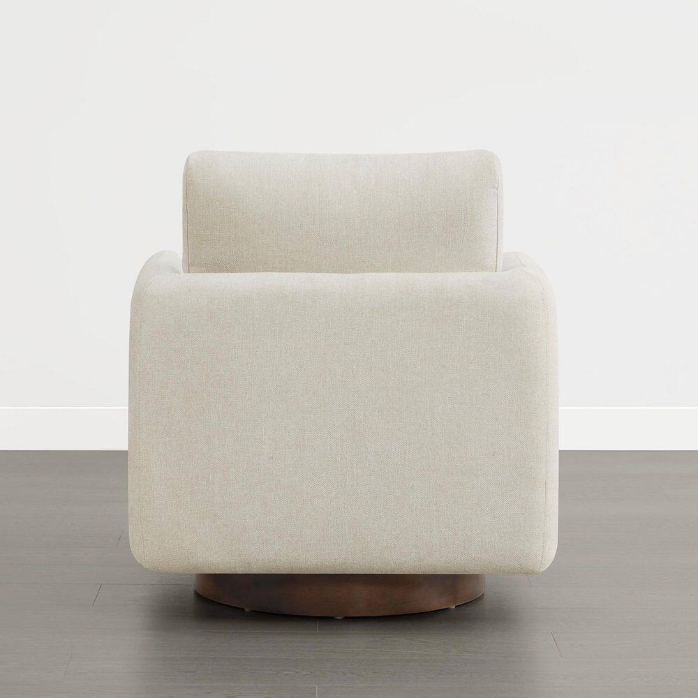 Back view of a cream linen swivel accent chair.