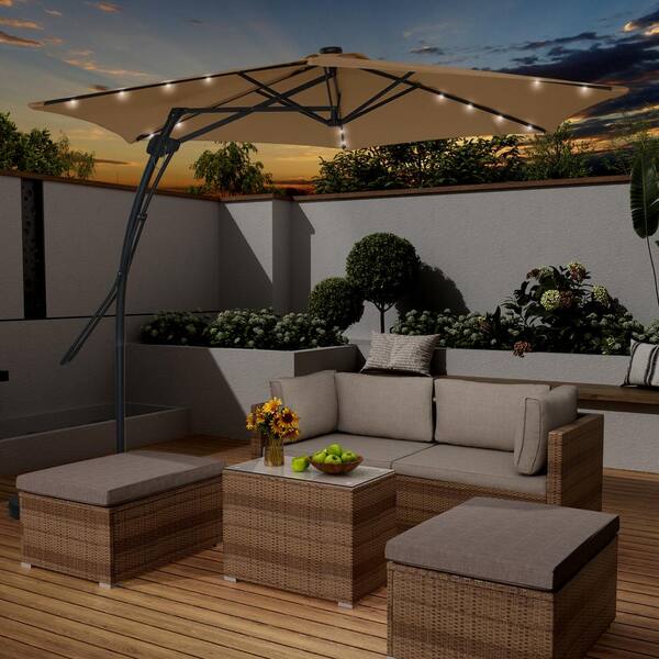 10 ft. Hexagon Tan Offset Patio Umbrella with Solar Lights and 4-Piece Umbrella Base