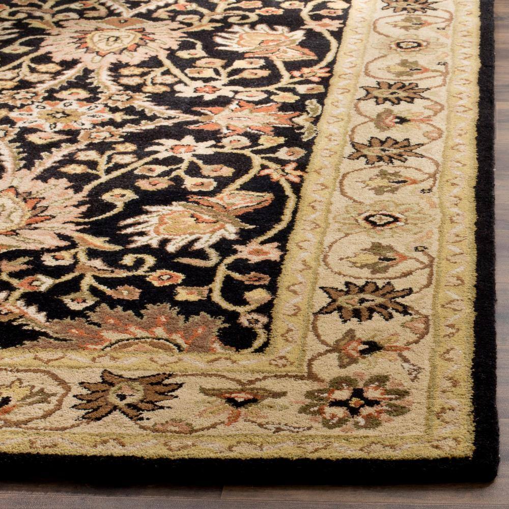 Handmade Black and Ivory Tufted Wool Area Rug