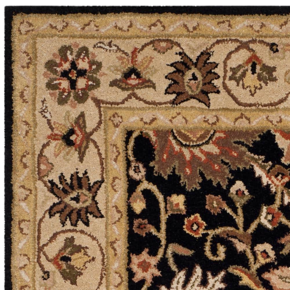Handmade Black and Ivory Tufted Wool Area Rug