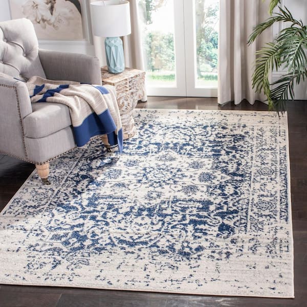 https://images.thdstatic.com/productImages/cd72bc0d-d7c1-4af6-92a0-7a8057298317/svn/cream-navy-safavieh-area-rugs-mad603d-4-e1_600.jpg