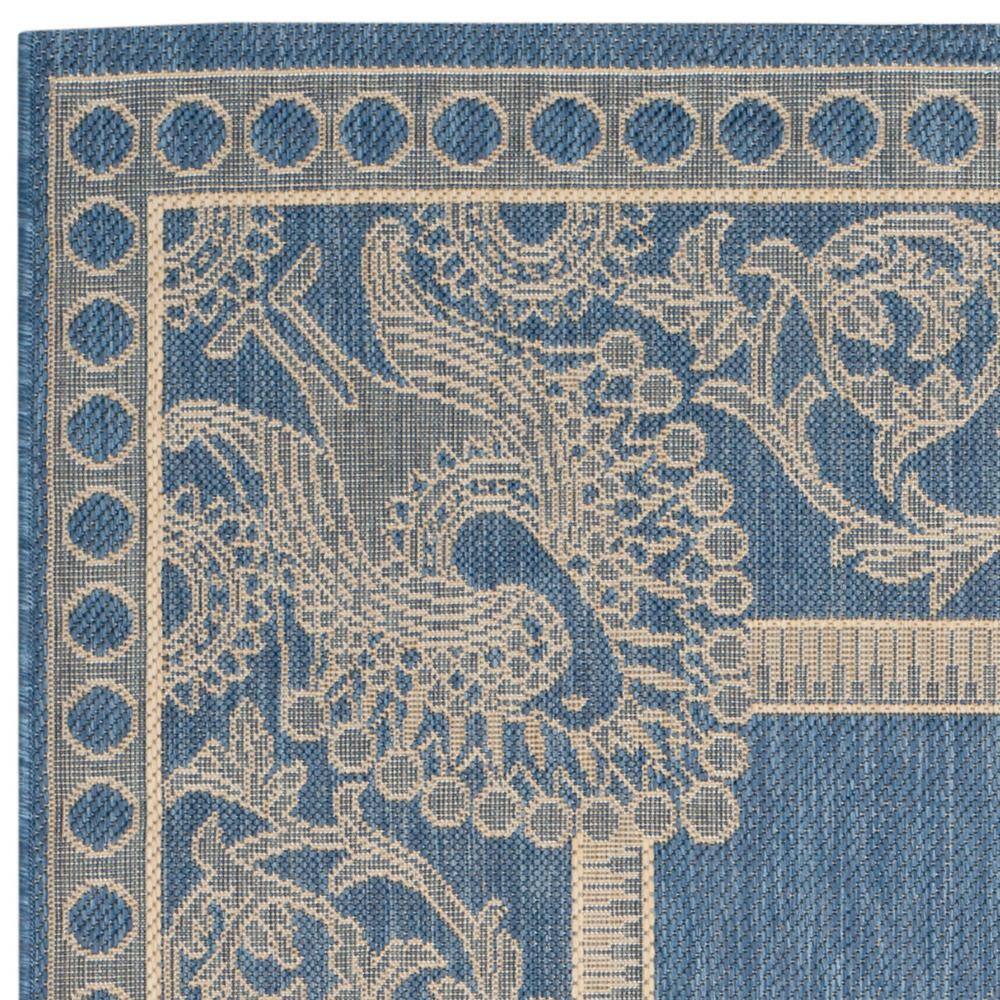 Blue and Natural Synthetic Stain-Resistant Indoor/Outdoor Area Rug