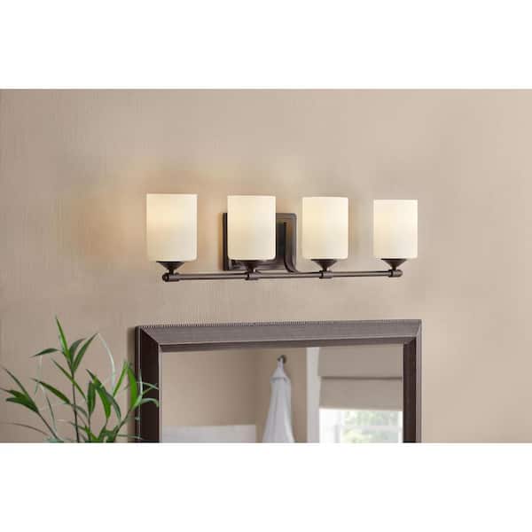 Hampton Bay Darlington 29.5 in. 4-Light Bronze Vanity Light with Frosted Opal Glass Shades