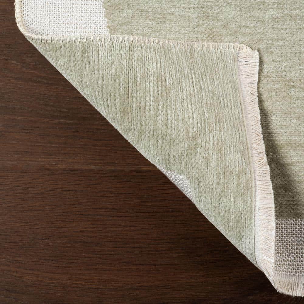Sevyn Green and White Abstract Reversible 4' x 6' Area Rug