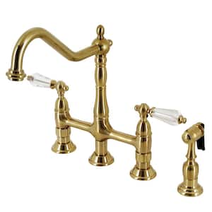 Wilshire Double-Handle Deck Mount Gooseneck Bridge Kitchen Faucet with Brass Sprayer in Brushed Brass