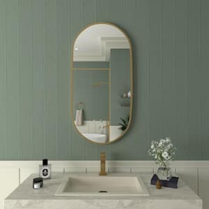 18 in. W x 36 in. H Oval Framed Wall Bathroom Vanity Mirror in Gold