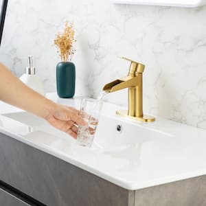 Mondawell Open Waterfall Single-Handle Single-Hole Low Arc Bathroom Faucet with Drain and Supply Lines in Brushed Gold
