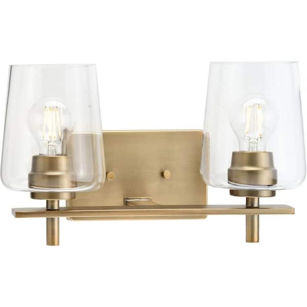 Progress Lighting Calais 14.62 in. 2-Light Vintage Brass Vanity Light with Clear Glass Shades New Traditional for Bath and Vanity