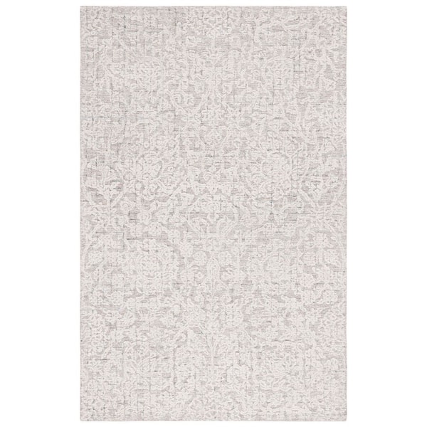 Metro 5 ft. x 8 ft. Beige/Ivory Distressed Marle Area Rug