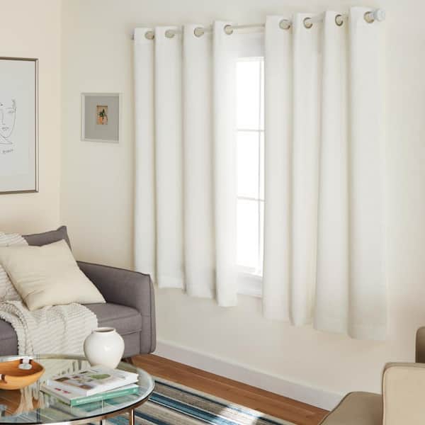 EXCLUSIVE HOME Lustre Vanilla Solid Woven Room Darkening Grommet Top Curtain, 52 in. W x 63 in. L (Set of 2)
