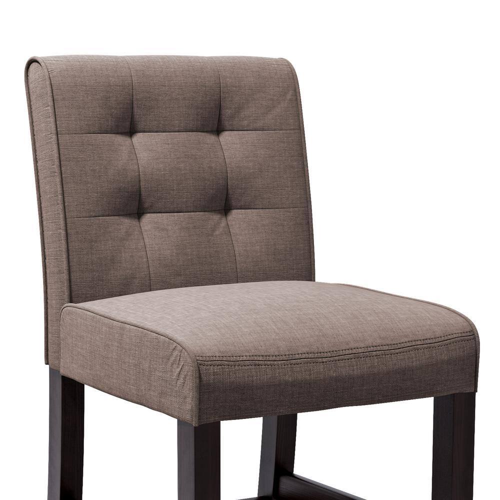 Close-up view of the tufted grey tweed fabric backrest of the bar stool.