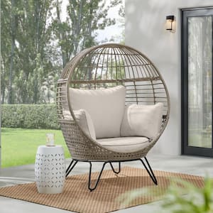 Tan Stationary Wicker Round Outdoor Lounge Egg Chair with CushionGuard Almond Biscotti Cushions