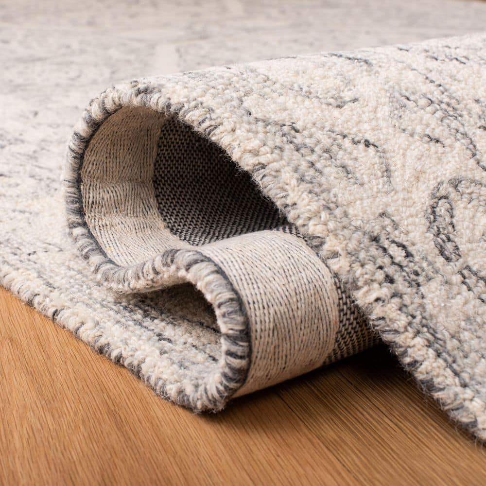 Ivory Elegance 10' x 14' Handmade Wool Tufted Rug