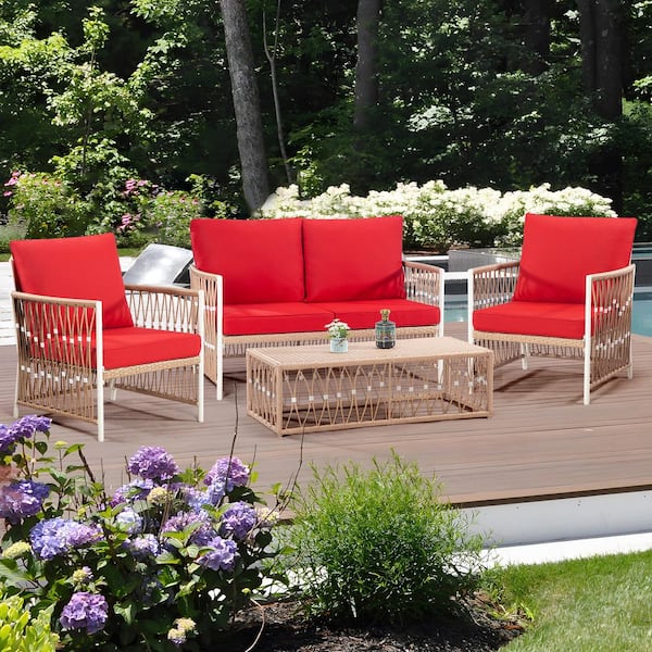 Brown Wicker Outdoor Couch Sofa with Red Cushions and Table