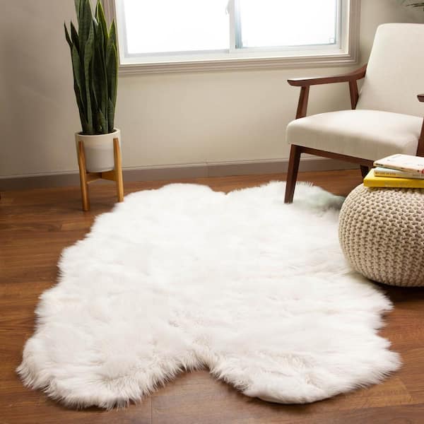 https://images.thdstatic.com/productImages/cdd10d28-70d0-4d47-bc31-218bc86c6772/svn/snow-white-super-area-rugs-area-rugs-sar-ser01-ivory-4x6-shaped-64_600.jpg