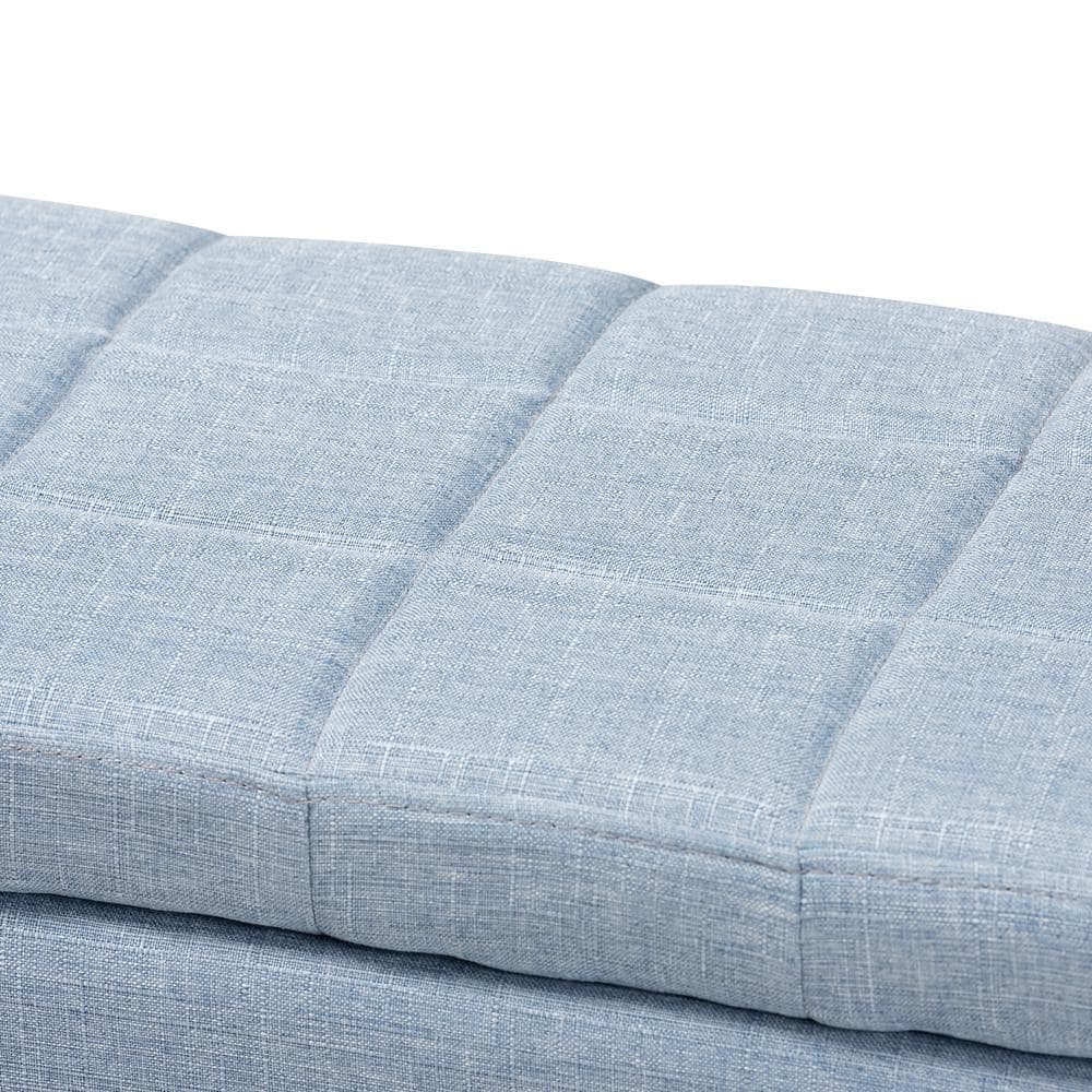 Light Blue Tufted Fabric Storage Ottoman with Black Wood Feet