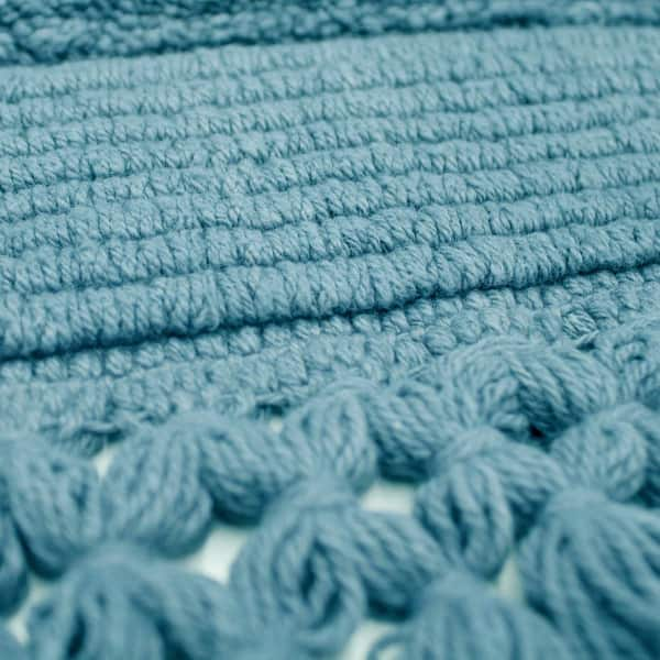 https://images.thdstatic.com/productImages/cddb1a40-f138-4293-93eb-5347cb3630ee/svn/dusty-blue-french-connection-bathroom-rugs-bath-mats-fcb000029-44_600.jpg