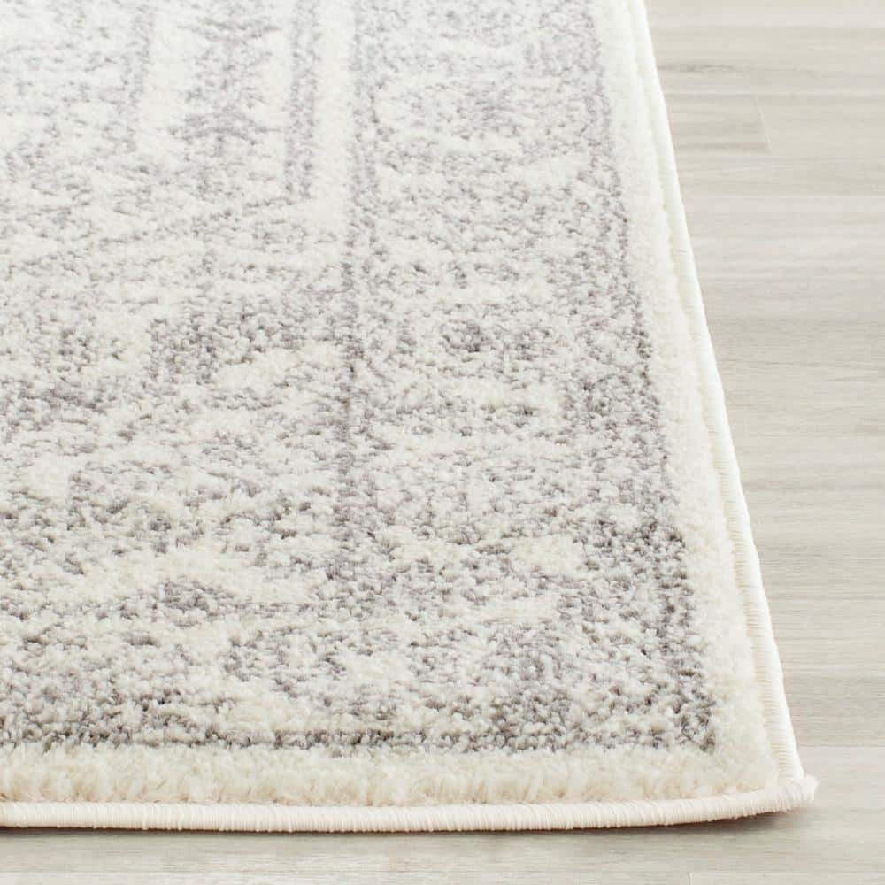Ivory and Silver Medallion Synthetic Runner Rug