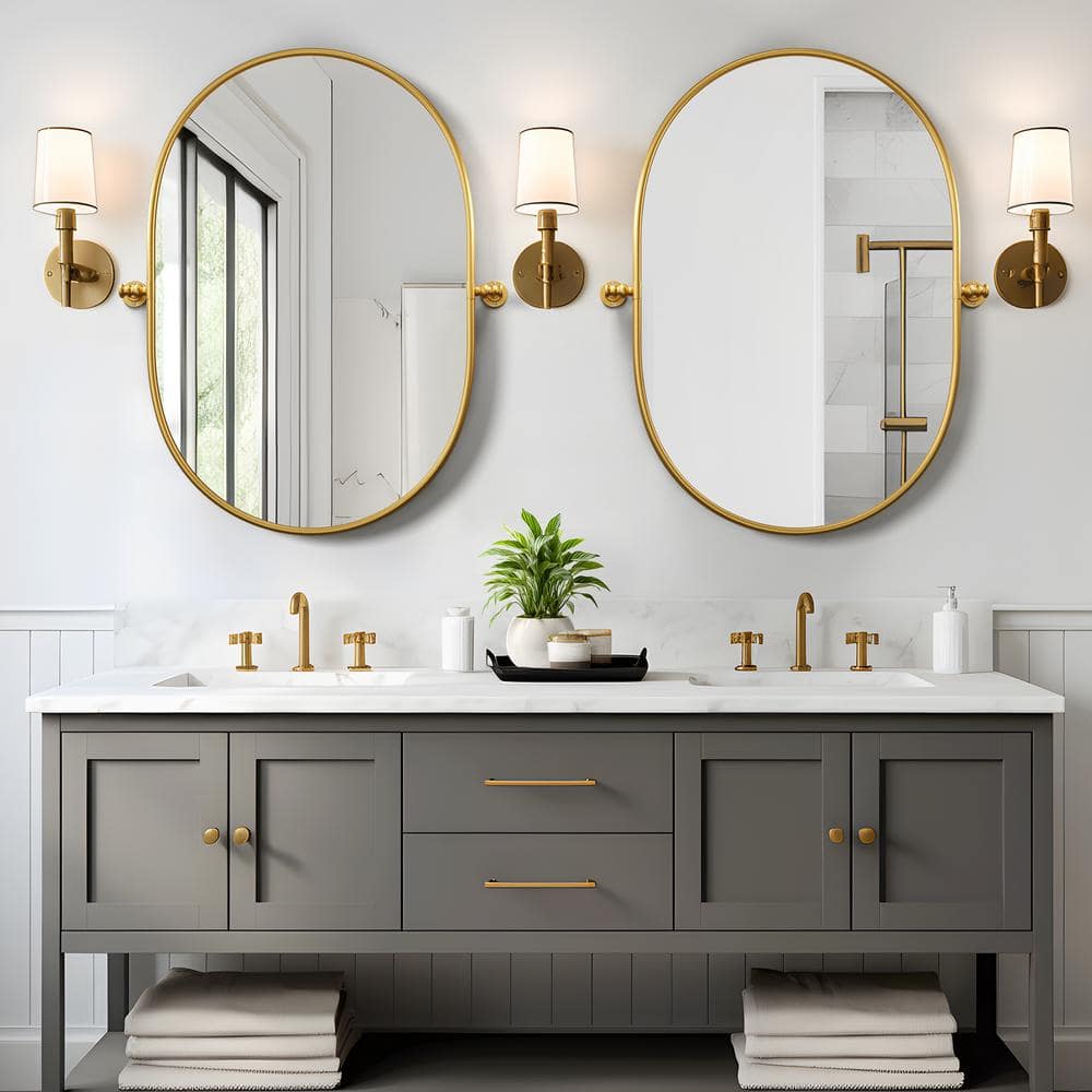 23 in. W x 31 in. H Oval Metal Framed Pivoted Bathroom Wall Vanity Mirror i