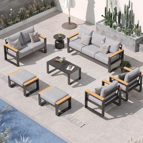 7-Piece Aluminum Outdoor Patio Furniture Set with 2 Ottomans, Light Grey Cushions and Coffee Table