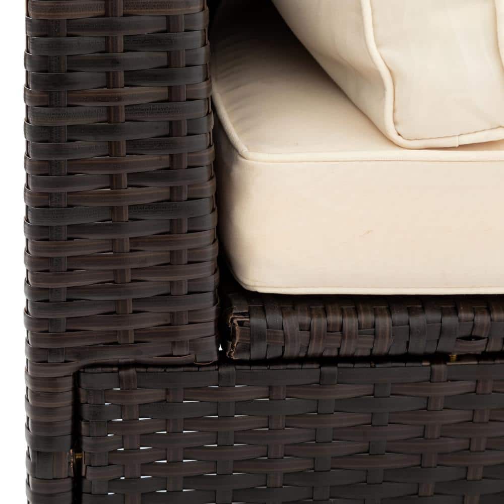 Close-up detail of the dark brown wicker weave and beige cushion.
