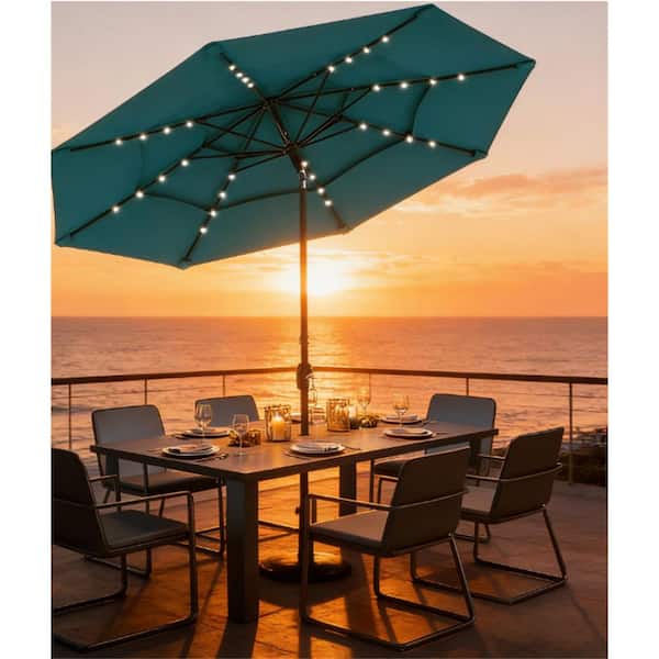 10 ft patio umbrella with solar lights Outdoor Powered LED Lighted Sun Shade – Tuesday Morning stable weighted base filled with dual sandbags for up to 40 kg and reinforced with 8 heavy Solar Led 10 Ft Umbrella