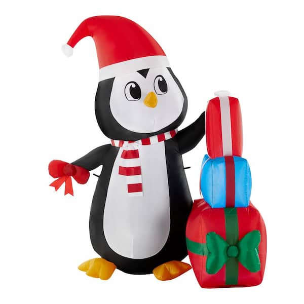 Home Accents Holiday 5 ft Pre-Lit LED Airblown Penguin with Gift Stack Scene Christmas Inflatable