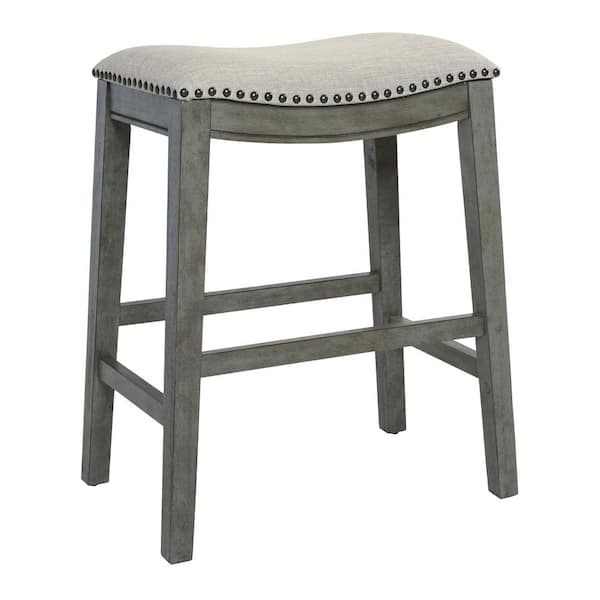 OSP Home Furnishings Saddle Stool 24 in. Grey Fabric and Antique Grey Base and Antique Bronze Nailheads (Set of 2)