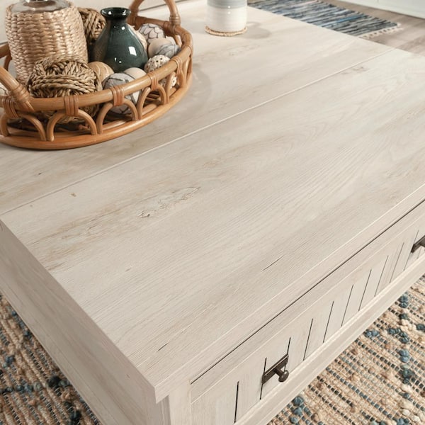 https://images.thdstatic.com/productImages/ce1d3374-8cdd-4b86-8fb8-306648760fbe/svn/chalked-chestnut-sauder-coffee-tables-427890-a0_600.jpg