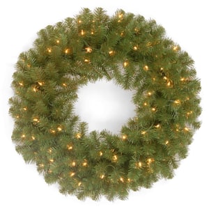 24 in. North Valley Spruce Artificial Wreath with Clear Lights