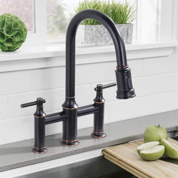 Pull Down Sprayer Double Handle Bridge Kitchen Faucet in Oil Rubbed Bronze