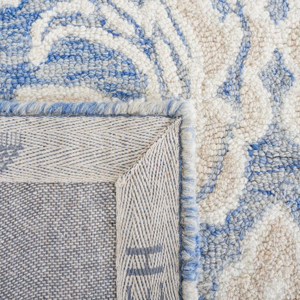 Handmade Medallion Tufted Wool Rug 9' x 12' in Blue and Ivory