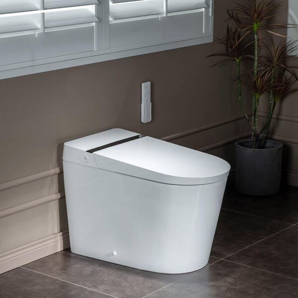 https://images.thdstatic.com/productImages/ce37dc16-1670-45fc-9845-2cc114591509/svn/white-teamson-kids-bidet-toilets-hb0990s-31_600.jpg