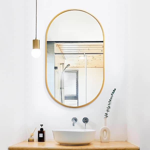 Nestfair 20 in. W x 33 in. H Gold Oval Brush Metal Framed Vanity Mirror