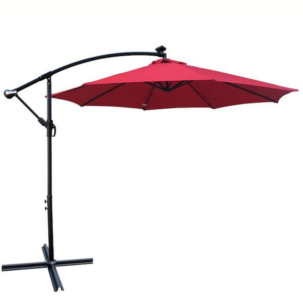 Staykiwi 10 ft. Steel Cantilever Market Solar-Powered LED Patio Umbrella in Red with Crank Lift and Cross Base
