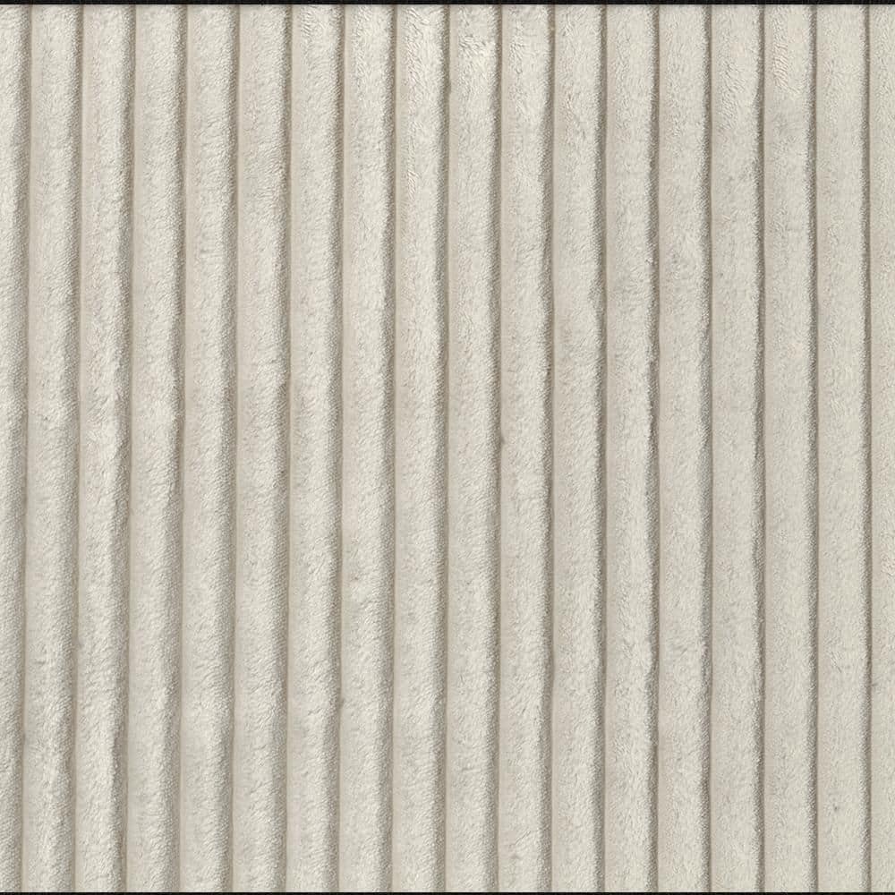 Close-up of beige corduroy fabric texture.