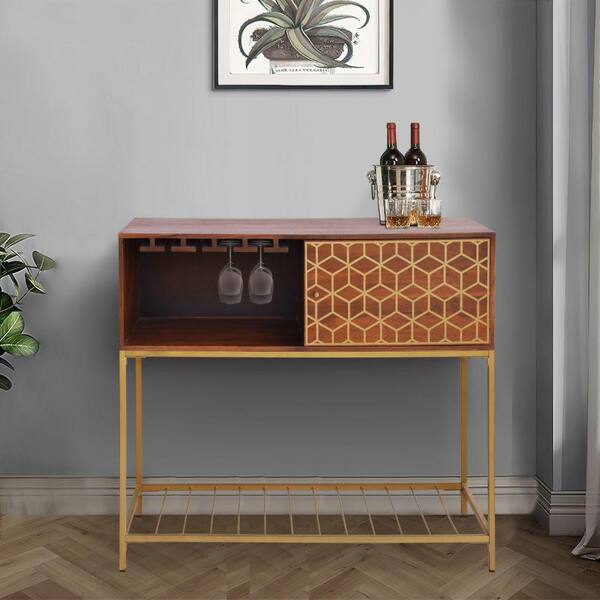 https://images.thdstatic.com/productImages/ce51397c-45be-4304-9ea5-1de555ec31c6/svn/brown-and-brass-the-urban-port-bar-cabinets-upt-276809-77_600.jpg