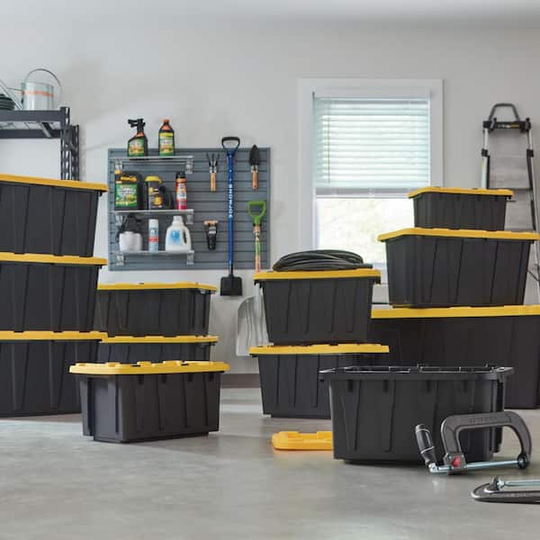 HDX 70 Gal. Tough Storage Tote with Wheels in Black with Yellow Lid 206203  - The Home Depot