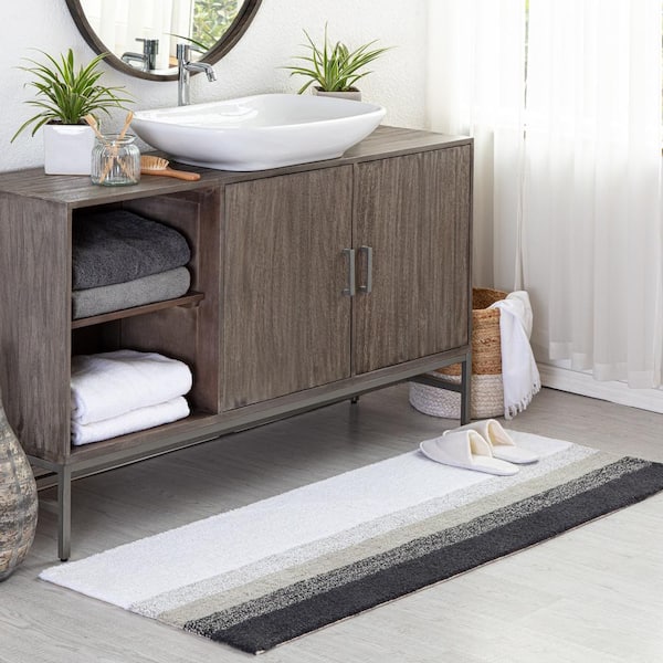 https://images.thdstatic.com/productImages/ce683509-d4d7-47e6-862c-294c12f0b693/svn/gray-mh-london-bathroom-rugs-bath-mats-mh-br-1045-40_600.jpg