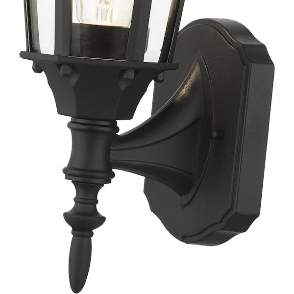 https://images.thdstatic.com/productImages/ce7a55ed-bd32-4543-ae53-fff72f00f9cd/svn/textured-black-livex-lighting-outdoor-sconces-7551-14-76_600.jpg