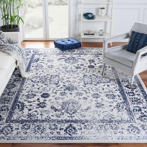 Adirondack Ivory/Navy 10 ft. x 14 ft. Border Distressed Area Rug