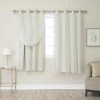 Ivory Grommet Overlay Blackout Curtain - 52 in. W x 63 in. L (Set of 2)