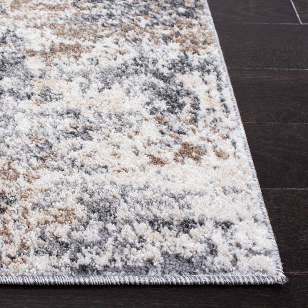 Aston Ivory and Gray Abstract Synthetic Area Rug 3' x 5'