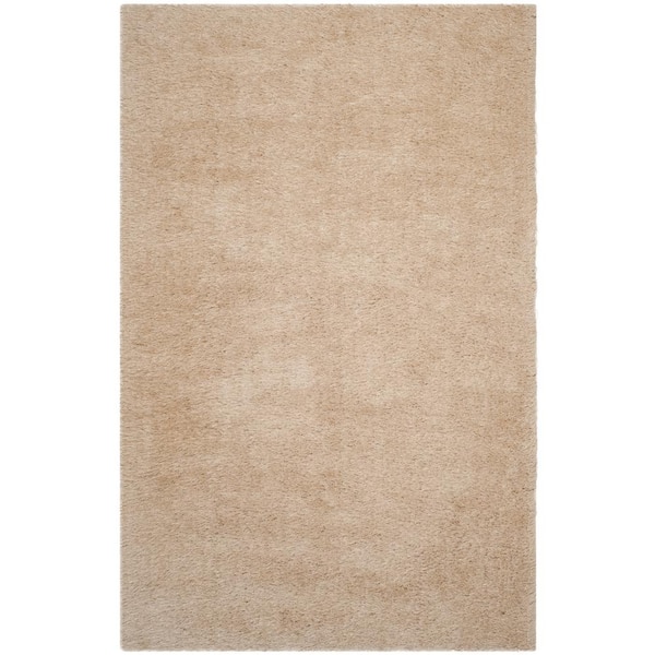 SAFAVIEH Venice Shag Champagne 5 ft. x 7 ft. Solid Area Rug