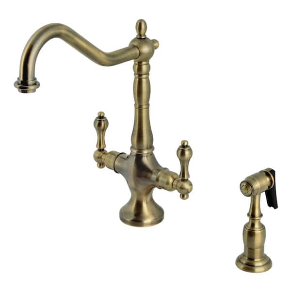 Kingston Brass Heritage Deck Mount Double Handle Single-Hole Standard Kitchen Faucet with Sprayer in Antique Brass
