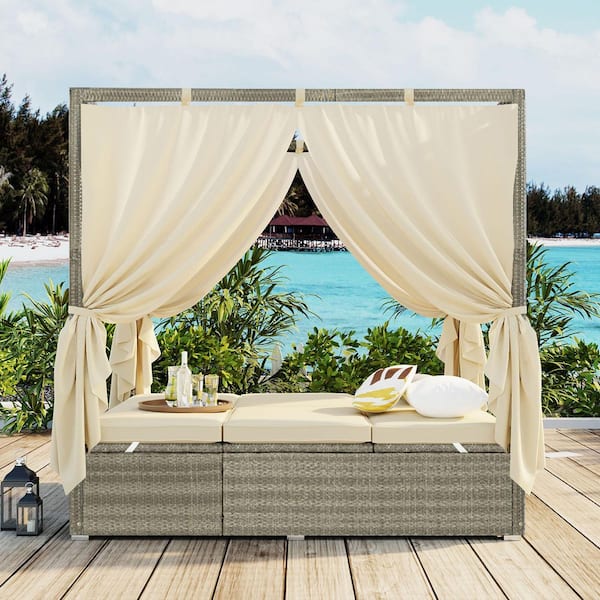 Wicker Outdoor Day Bed with Beige Cushions and Curtain