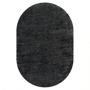 Haze Solid Low-Pile Black 5 ft. x 8 ft. Oval Area Rug